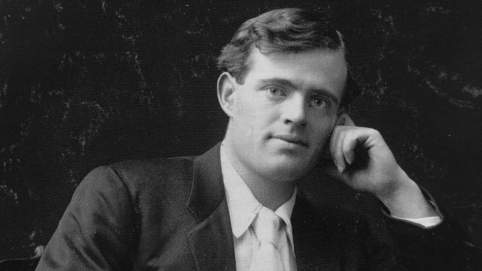 Vintage portrait of Jack London at his writing desk